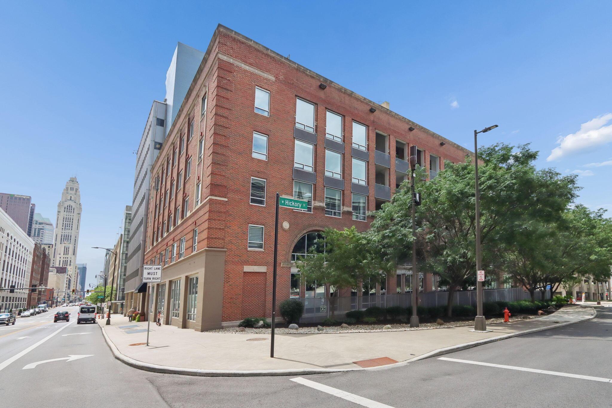 Brick condominium building at the corner of North Front Street and West Hickory Street in downtown Columbus